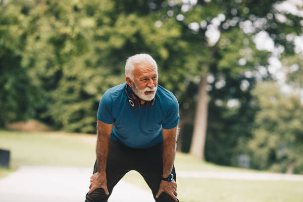 istock Old man resting after series of exercises. 1297262414