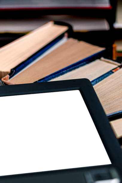 istock An e-book with a white screen and a place for text is on a shelf with books 1297263315
