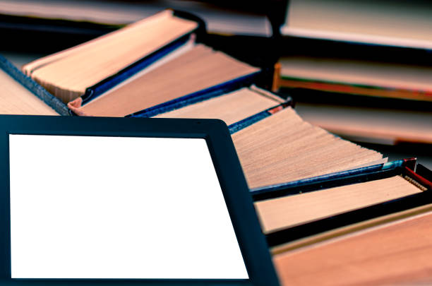 istock An e-book with a white screen and a place for text is on a shelf with books 1297263321
