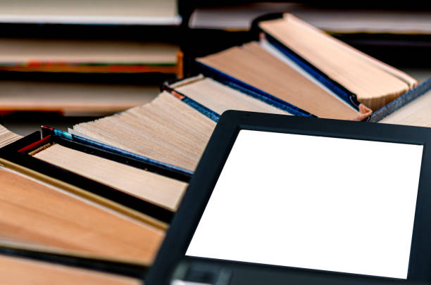 istock An e-book with a white screen and a place for text is on a shelf with books 1297263326