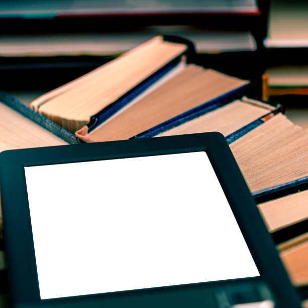 istock An e-book with a white screen and a place for text is on a shelf with books 1297263327