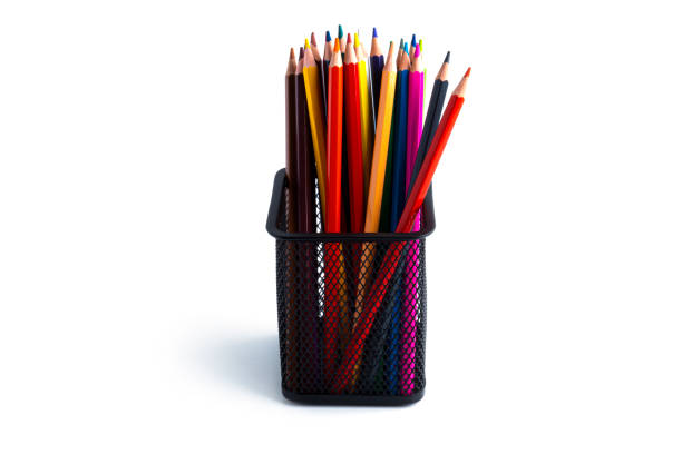 istock Colorful pencils in the organizer are isolated on a white background 1297263426