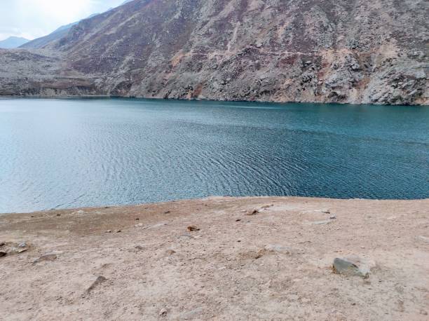 istock Blue Lake of Glacier water in between mountains 1297264865