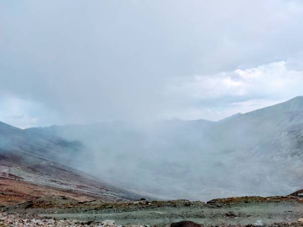 istock Rain in the valley as seen by a mountain top 1297264926