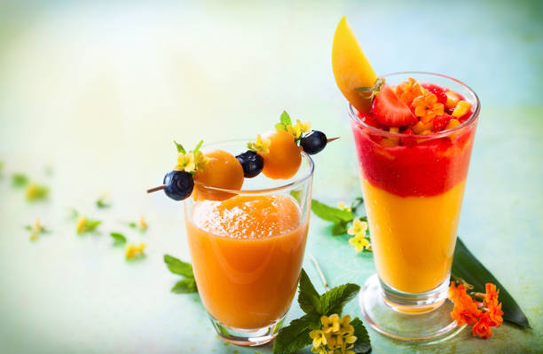 istock Melon,mango and strawberry smoothie with fruit skewer 1297265140