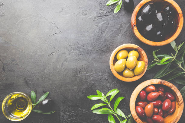 istock Black and green olives 1297265644