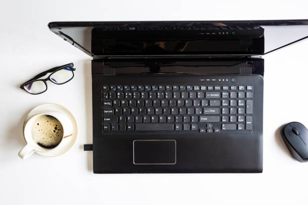 istock black laptop and girls hands 1297265648