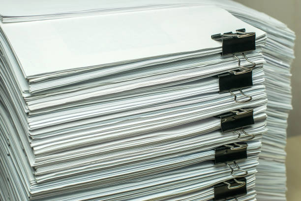 istock pile of paper documents in the office 1297266365