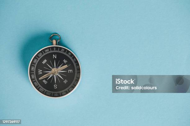 Compass Stock Photo - Download Image Now - Navigational Compass, Cut Out, Blue Background