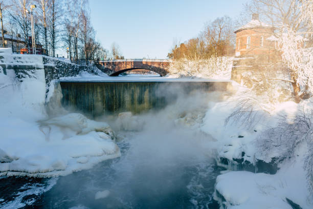 istock Beautiful Winter forest landscape - trees covered snow and river, lapland 1297269623