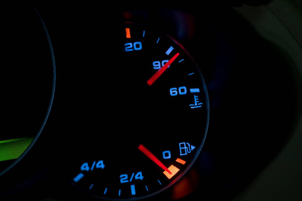 istock Empty fuel warning light in car dashboard. Fuel pump icon. gasoline gauge dash board in car with digital warning sign of run out of fuel turn on. Low level of fuel show on speedometer dashboard. 1297271677