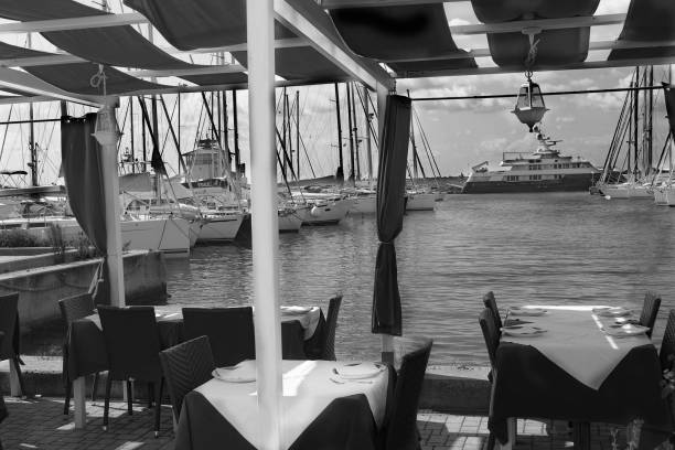 istock Rome port view through the tables of a restaurant 1297272766
