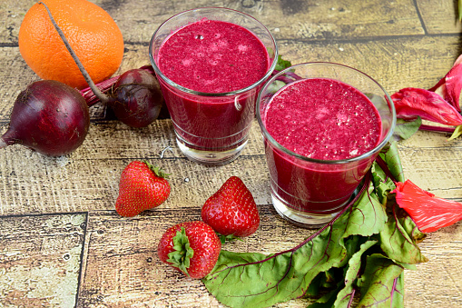 Fresh healthy strawberry beetroot smoothie with hemp seeds