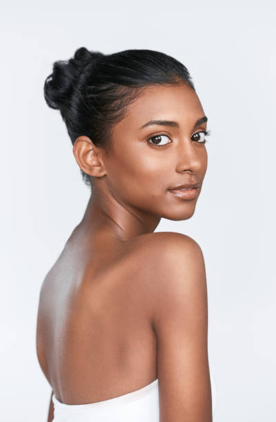 Every day should be a good skin day Shot of a beautiful young woman posing against a white background strapless stock pictures, royalty-free photos & images