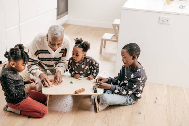 istock Play dough construction with grandmother and kids 1297274262