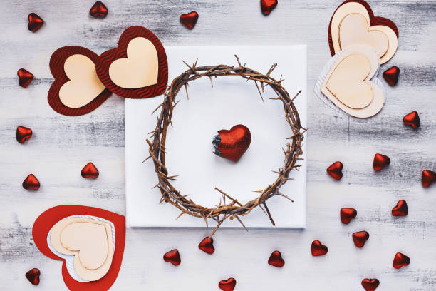 istock Canvas with Crown of Thorns and Valentines Day Hearts 1297274565