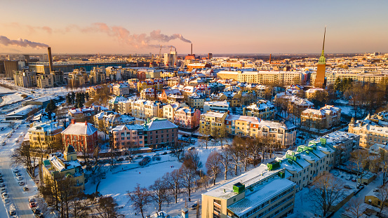 This picture shows how Helsinki city look from drone in winter time. The aerial view of helsinki shows thats it look vey colorful from sky and snow covered buildings.
