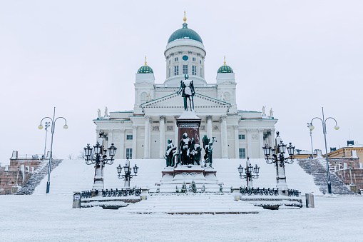 This image shows snow covered Helsinki Cathedral in winter time in helsinki finland.