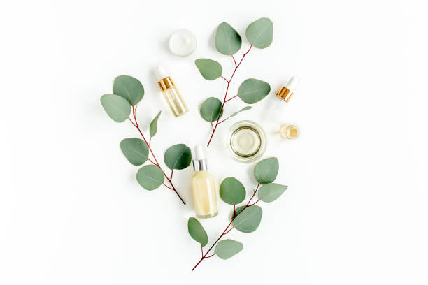 istock Eucalyptus essential oil, eucalyptus leaves on white background. Natural, Organic cosmetics products. Medicinal, Natural Serums. Flat lay, top view 1297279864