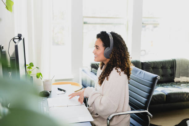 istock Female customer service rep assisting customer 1297281453