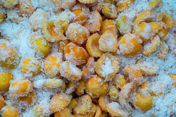 Apricots in powdered sugar for apricot marmalade. stock photo