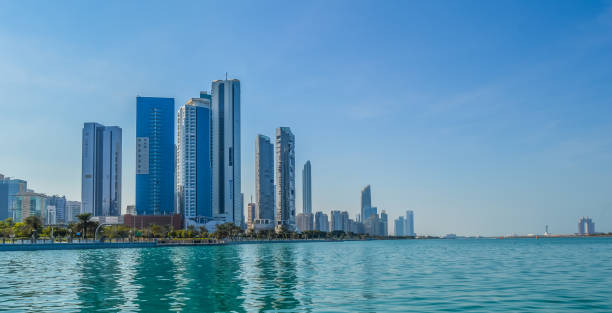 istock Abu Dhabi city skyline along Corniche beach taken from a boat 1297286370