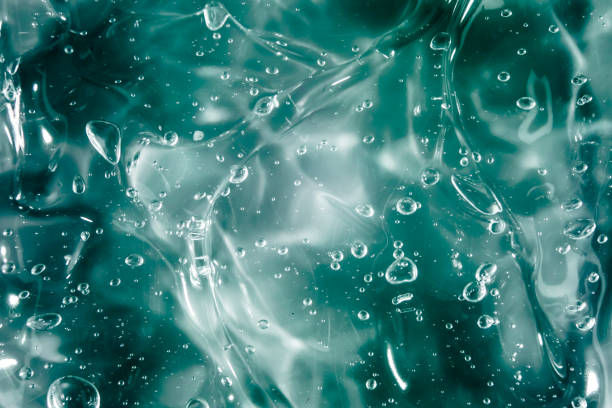 istock Liquid cream gel, green blue cosmetic texture with bubbles 1297288031