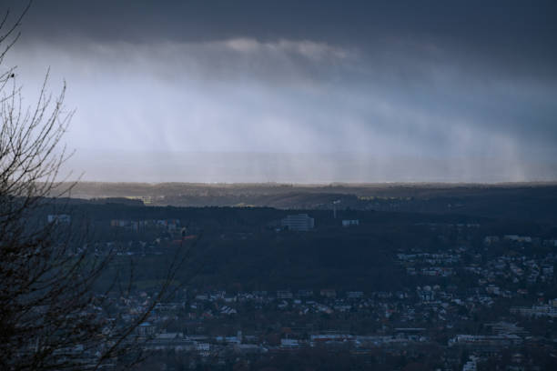 istock View over Bonn with an approaching storm in January. 1297290827