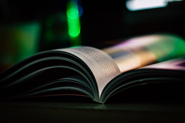 istock Open book on the school desk 1297292678