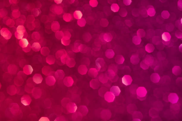 istock Red and pink glitter lights background 1297293730