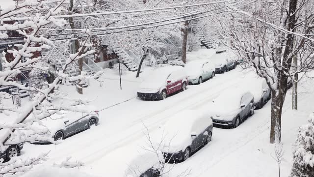 Elevated view of Montreal Rosemont area residential street during a snow storm