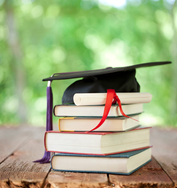 Graduation Cap and Diploma Concept