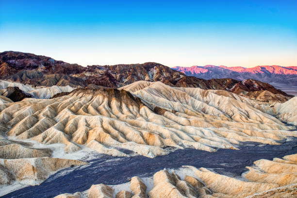 badlands view from zabriskie point in death valley national park at sunset, california - natural land state imagens e fotografias de stock