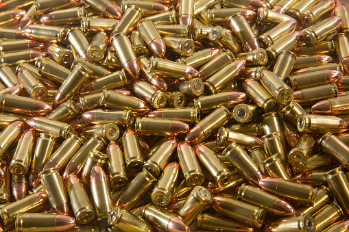 A small pile of 9mm FMJ ammo