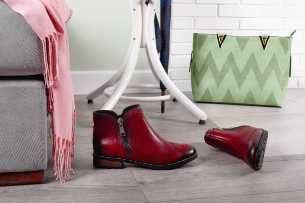 istock Stylish hallway interior with with clothes and shoes 1297302916