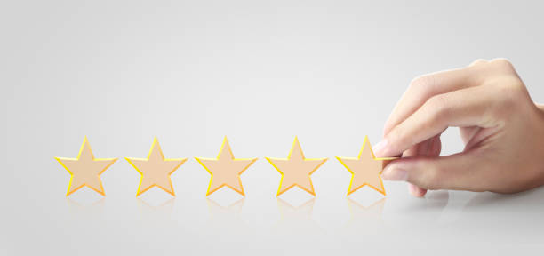 istock Five stars in hand. Increase rating evaluation 1297303706