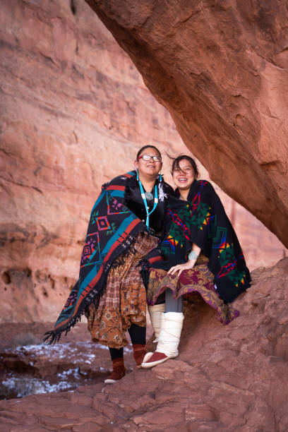 istock Navajo sisters in Monument Valley 1297304105