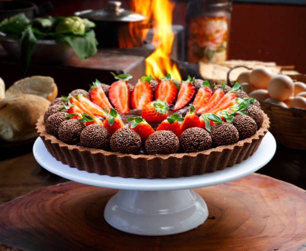 istock chocolate pie with strawberries and Brigadeiro sweets 1297305031