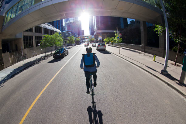 istock Middle of the Road Bicycle Messenger 1297305239