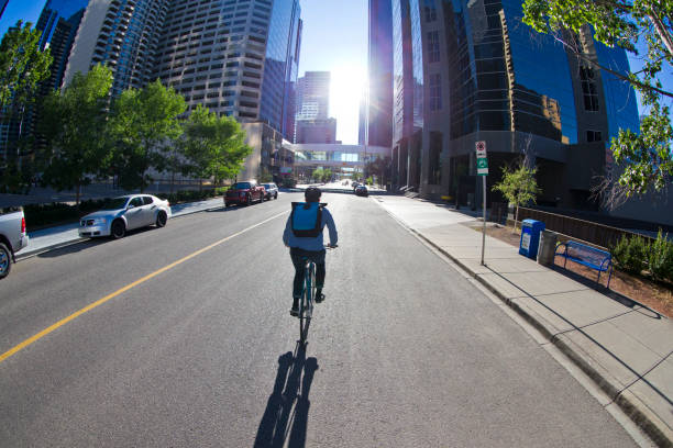 istock Middle of the Road Bicycle Messenger 1297305288
