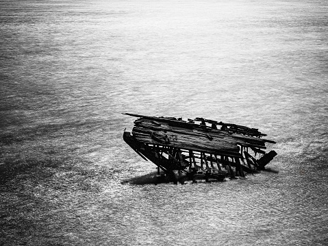 The tourist destination of the rustic hull of the Peter Iredale, shipwrecked on the Oregon coast in 1906, remains photogenic.