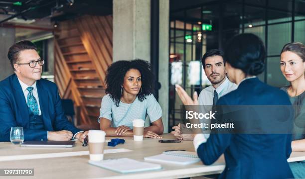 Company Management On A Meeting Stock Photo - Download Image Now - Office, Business, Teamwork