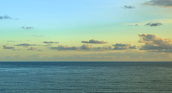 Sky and sea horizon in the late afternoon.
