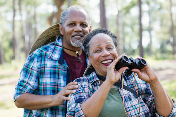 istock Senior African-American couple bird watching 1297313886