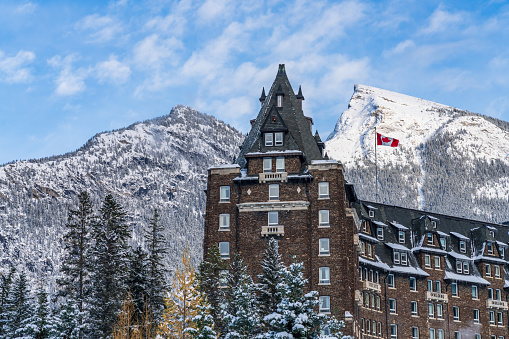 Fairmont Banff Springs in winter sunny day. Banff National Park, Canadian Rockies.