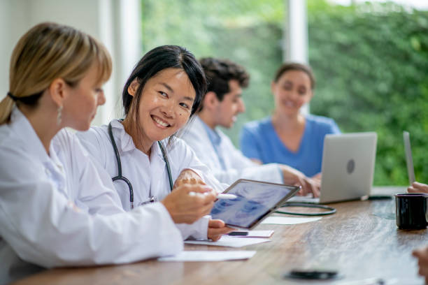 istock Medical professionals working together in a meeting 1297320783