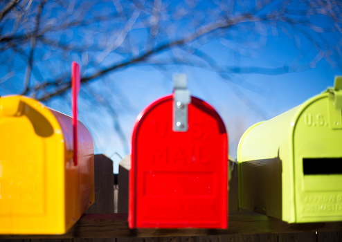 Three Colorful Vintage Rural Mailboxes.