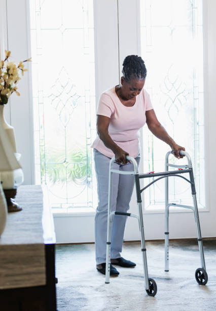 istock Senior African-American woman using walker 1297322883