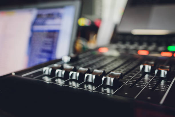 istock Part of an audio sound mixer with buttons. 1297324202
