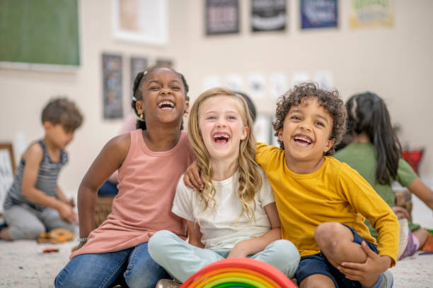 istock Cute children in preschool classroom 1297329109